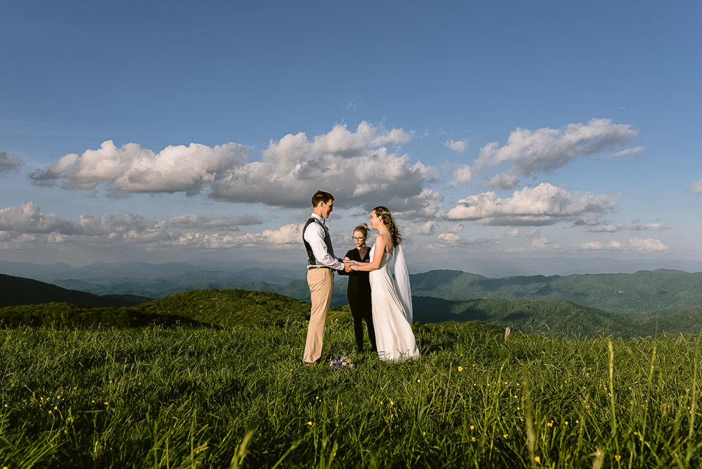 Bride and groom exchange vows at the top of max patch.
