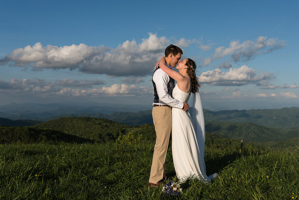 Bride and groom exchange vows at the top of max patch.