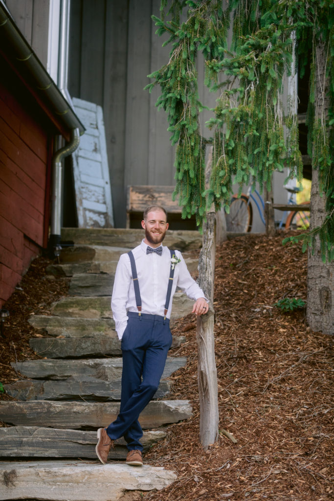 Groom portrait before the elopement as he waits on the stairs.