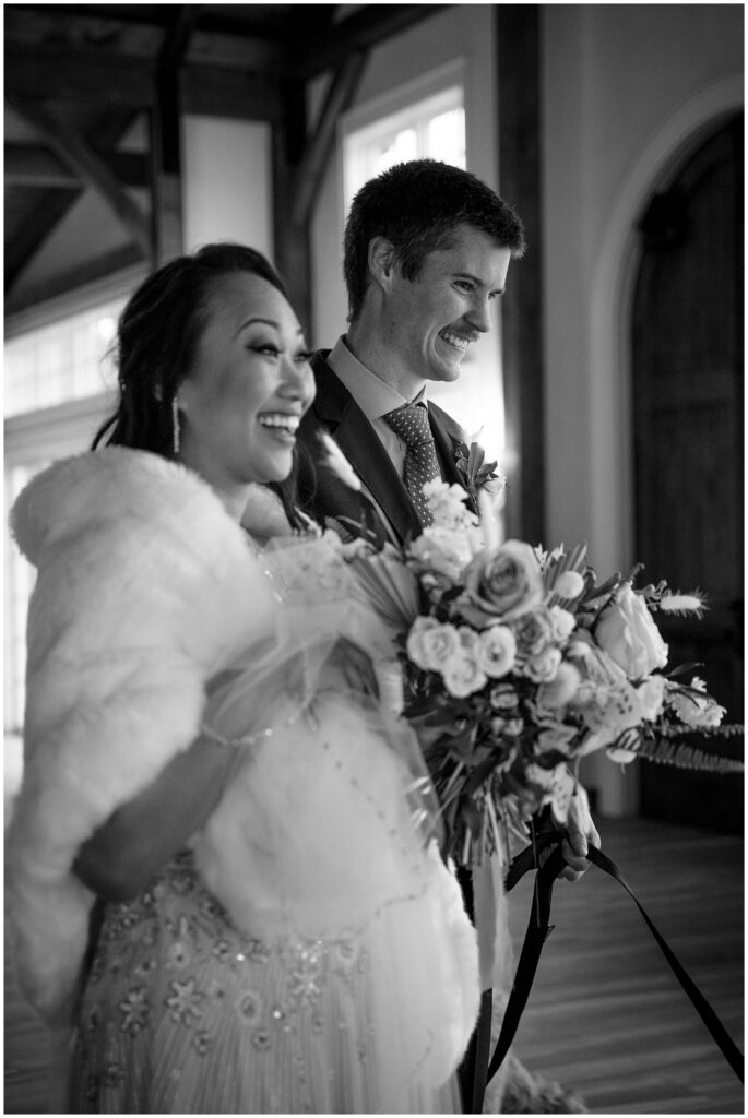 the bride and groom walking outdoors