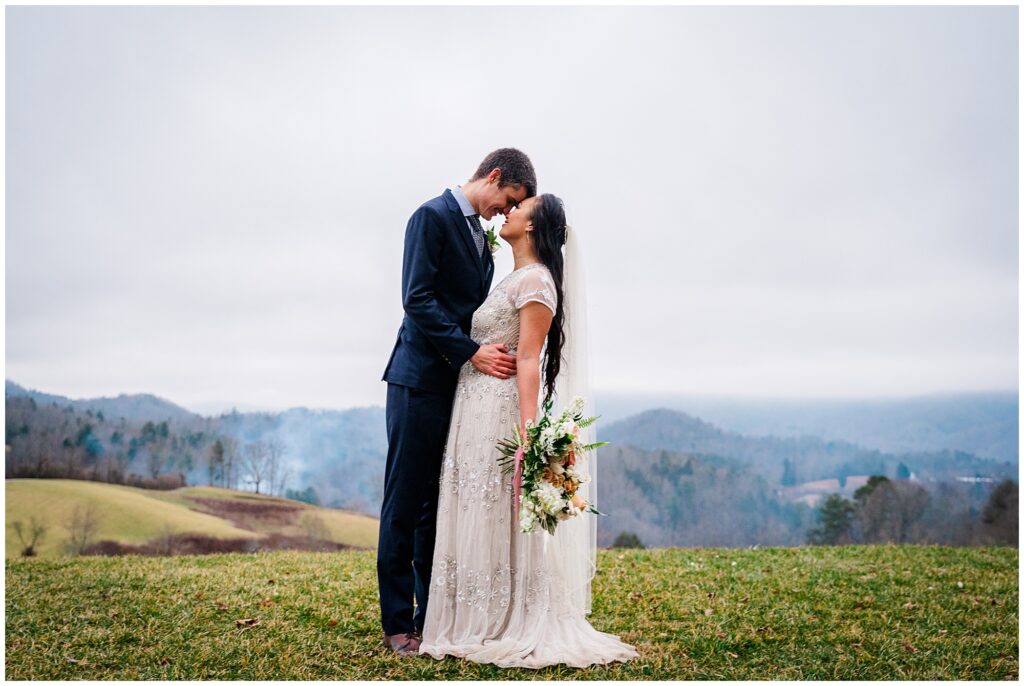 bride and groom at the Ridge in asheville with rolling mountain views