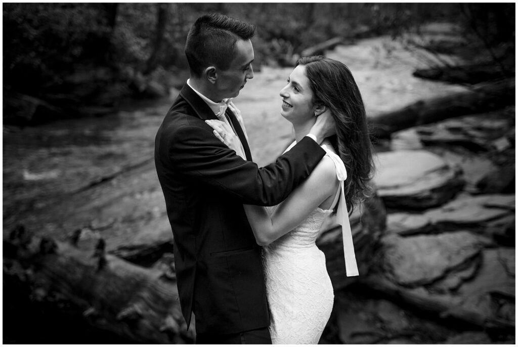 black and white bride and groom waterfall portrait in Asheville | Legacy & Legend All-Inclusive Elopement