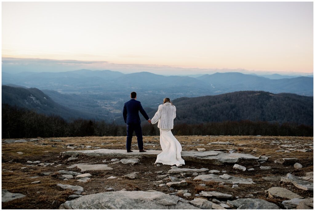 The bride and groom looking out at the mountains during their Bearwallow mountain elopement.