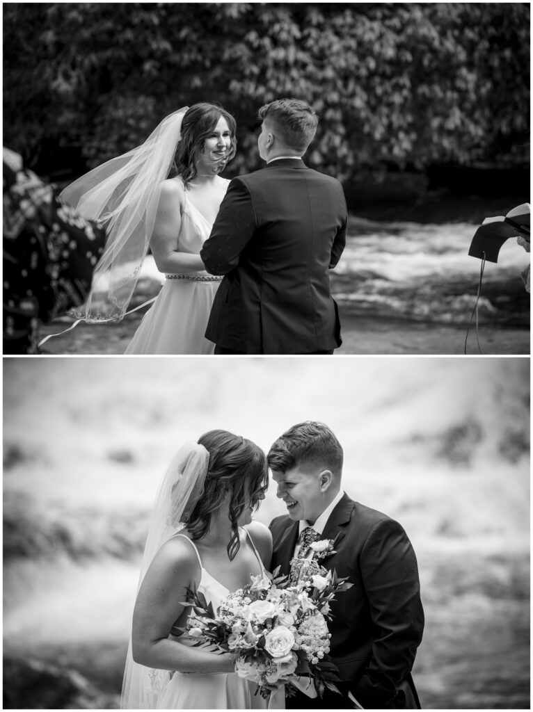 Black and white ceremony image of the couple holding hands.