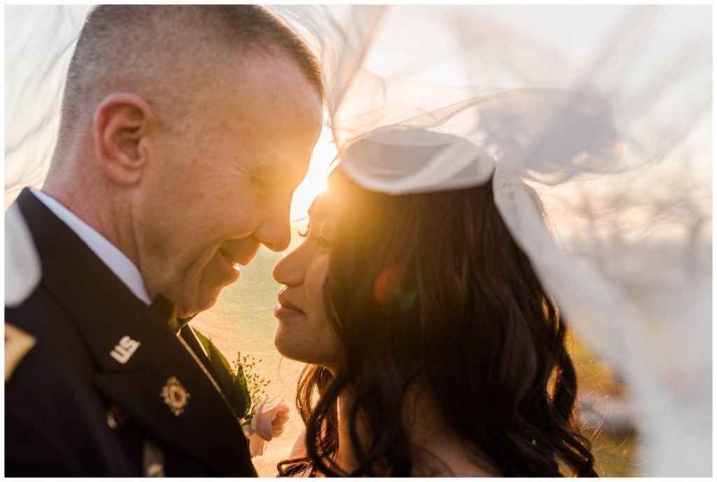 Bride and groom on top of a mountain for their spring elopement in Asheville NC.