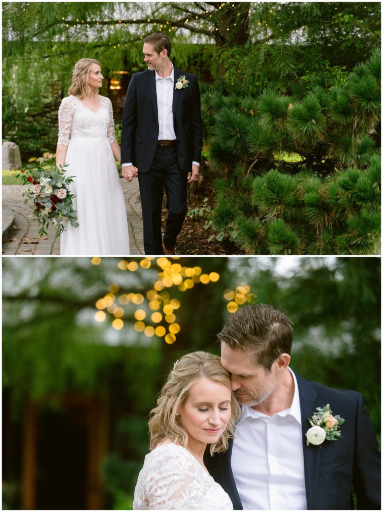 Bride and groom walking through a zen garden together after getting married.