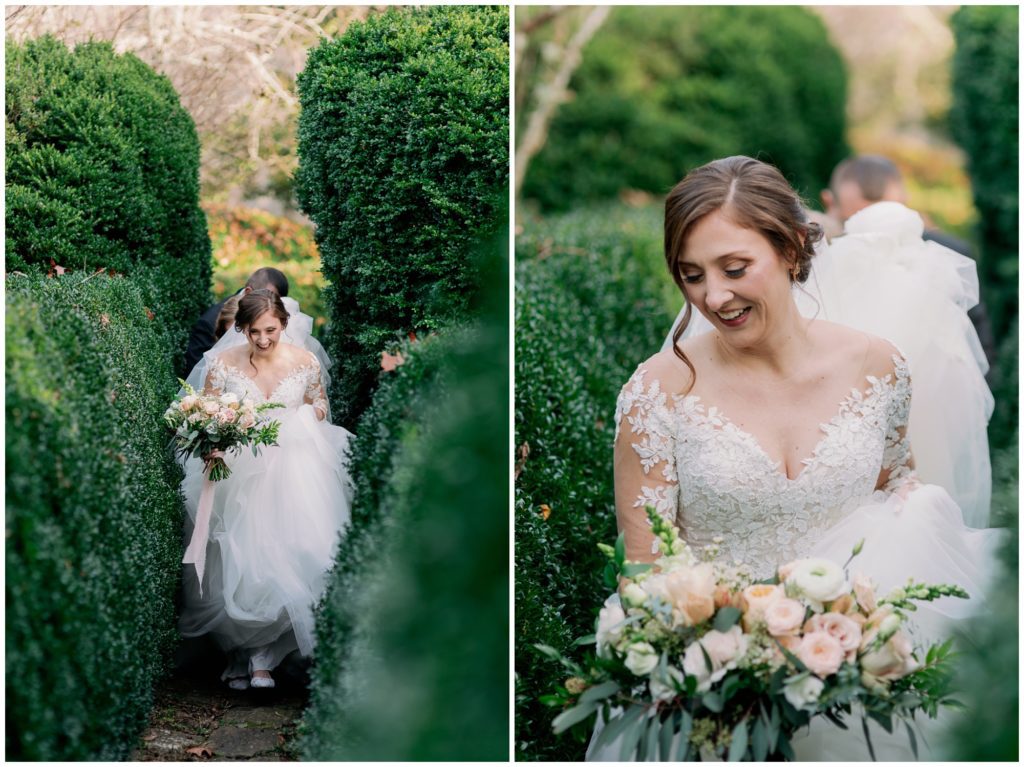 The bride walking through the garden to her elopement as her friends carry the train of her dress.