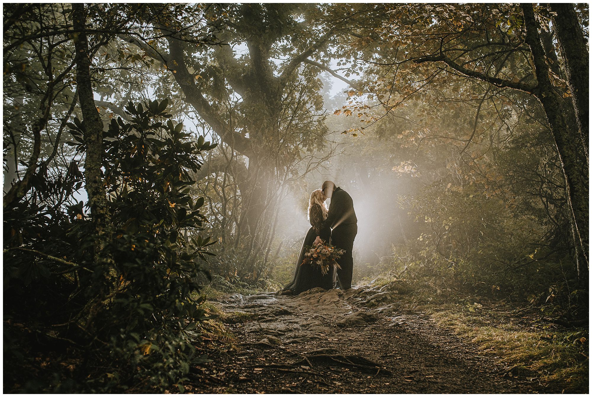 Magical foggy portrait with fog and light shining through the fog