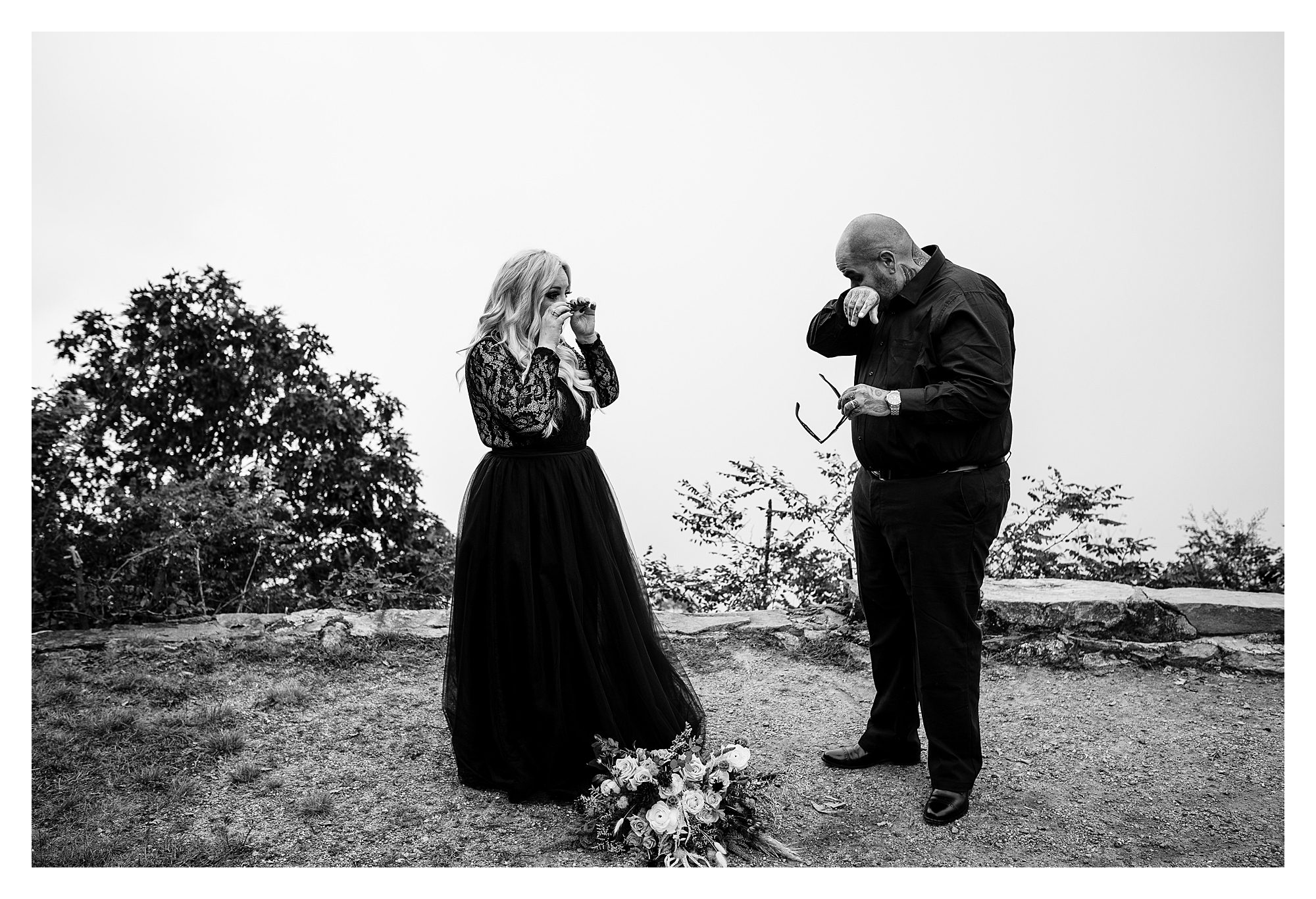 Black and white image of the bride and groom crying during their elopement in NC | Legacy and Legend