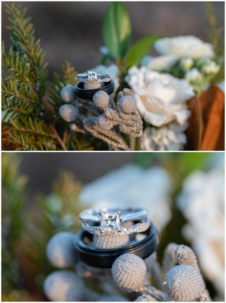 A winter bridal bouquet with a square engagement ring and wedding bands.