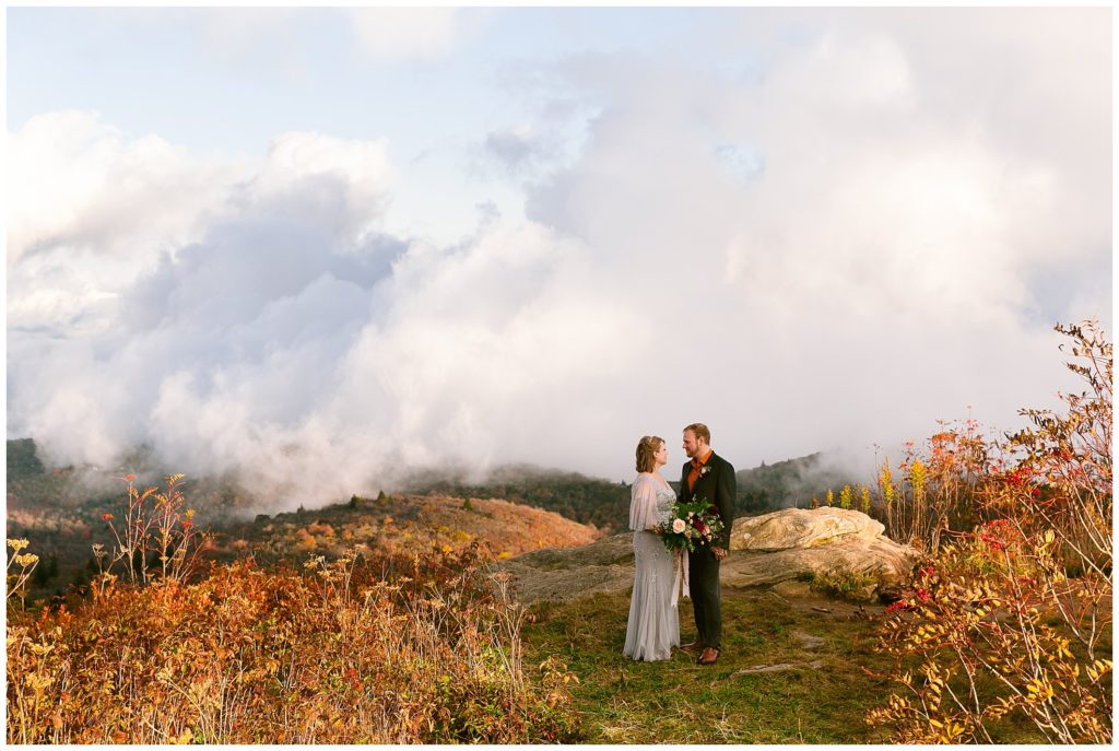 Fall elopement on a mountain with fog  | Asheville Elopements
